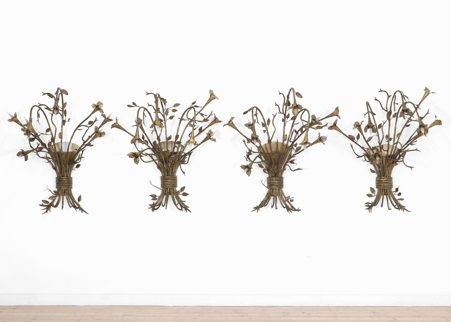 A SET OF FOUR GILT TOLE BOUQUET WALL SCONCES