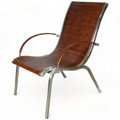 A PAIR OF MIDCENTURY LEATHER ARMCHAIRS